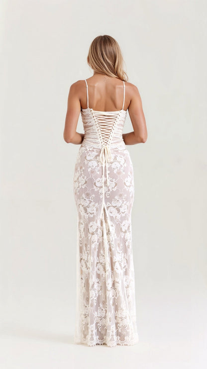 A long, floral-patterned dress with a corset-style bodice, designed for formal events such as weddings. The dress features lace details and a 2