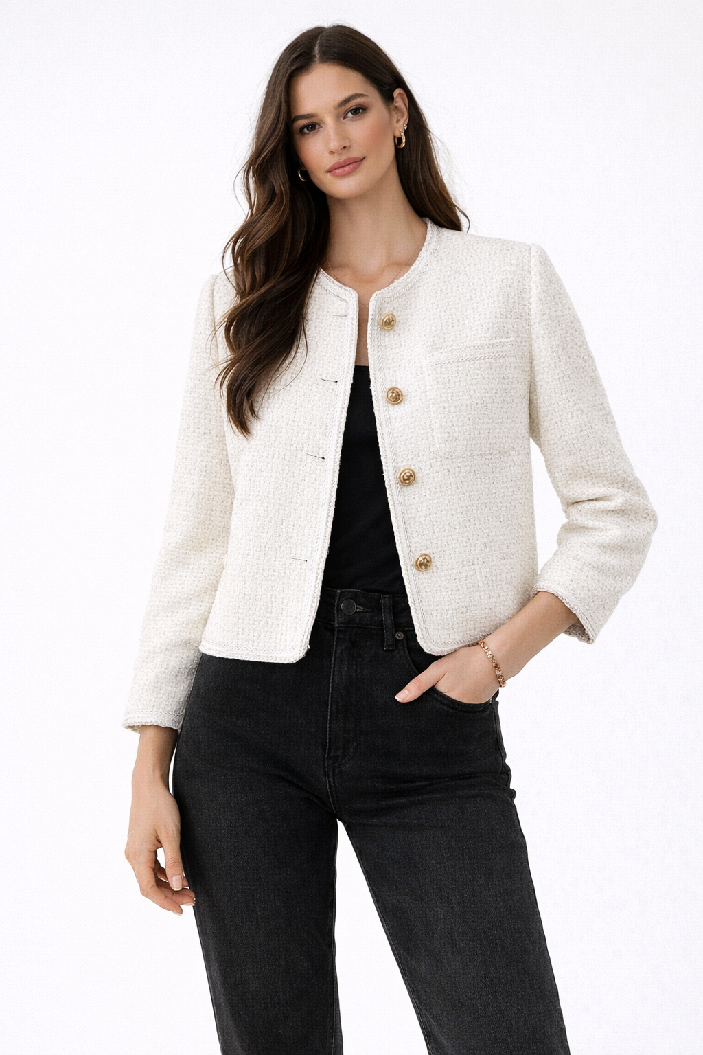 Short women's tweed blazer featuring a round neckline and metal buttons. 0