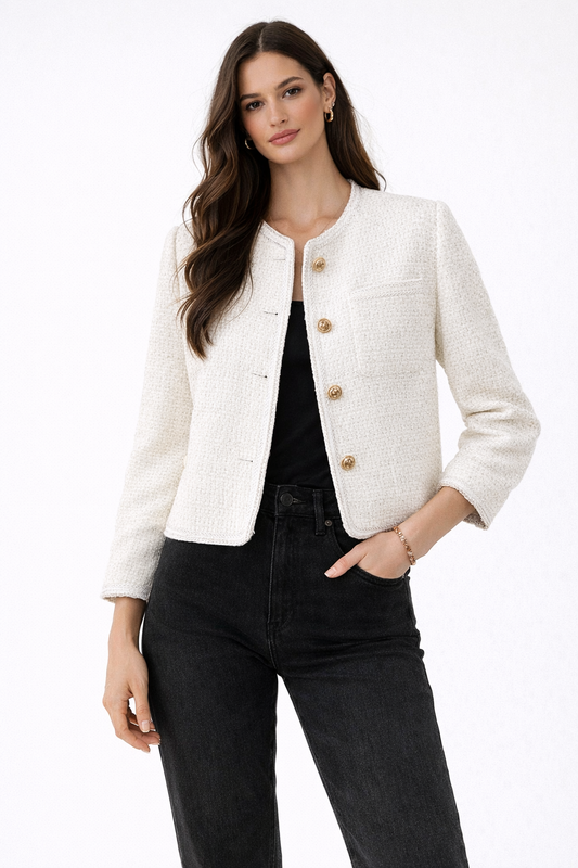 Short women's tweed blazer featuring a round neckline and metal buttons. 0