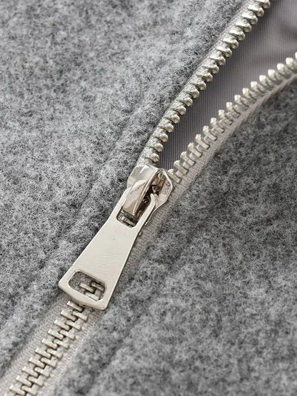 Women's bomber jacket with a round neckline and a loose fit. 3