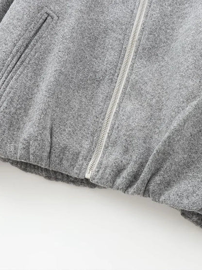Women's bomber jacket with a round neckline and a loose fit. 8