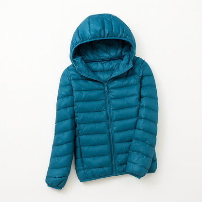 Women's puffer jacket with a hood, designed for cold weather, featuring a zip closure and side pockets. 17