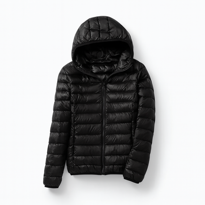 Women's puffer jacket with a hood, designed for cold weather, featuring a zip closure and side pockets. 18