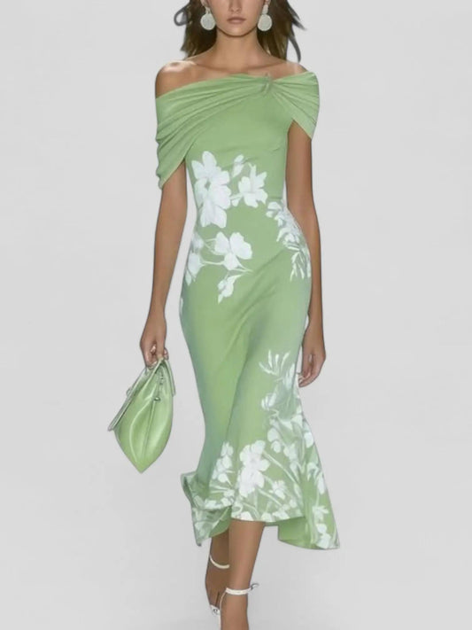 Dresses for women featuring a floral pattern and a draped finish, designed for formal events like weddings. 0