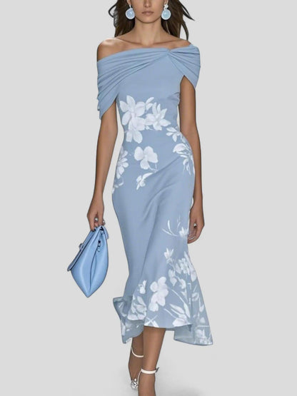 Dresses for women featuring a floral pattern and a draped finish, designed for formal events like weddings. 1