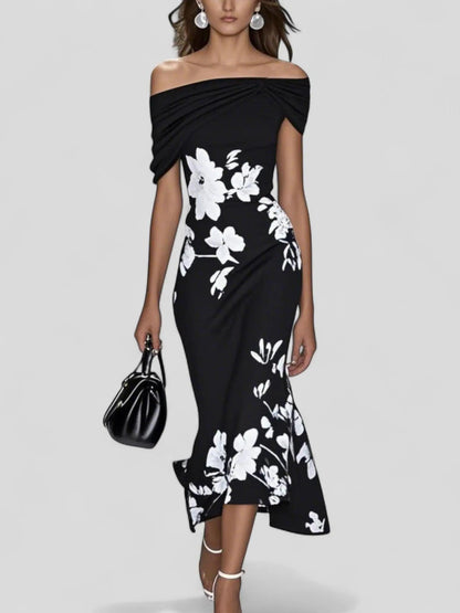 Dresses for women featuring a floral pattern and a draped finish, designed for formal events like weddings. 2