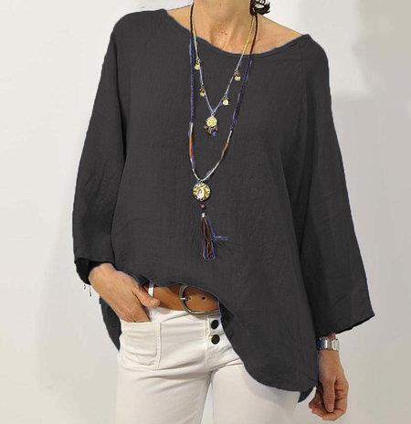 Loose women's long-sleeve blouse with a round neckline, featuring a relaxed fit and elegant design. 0