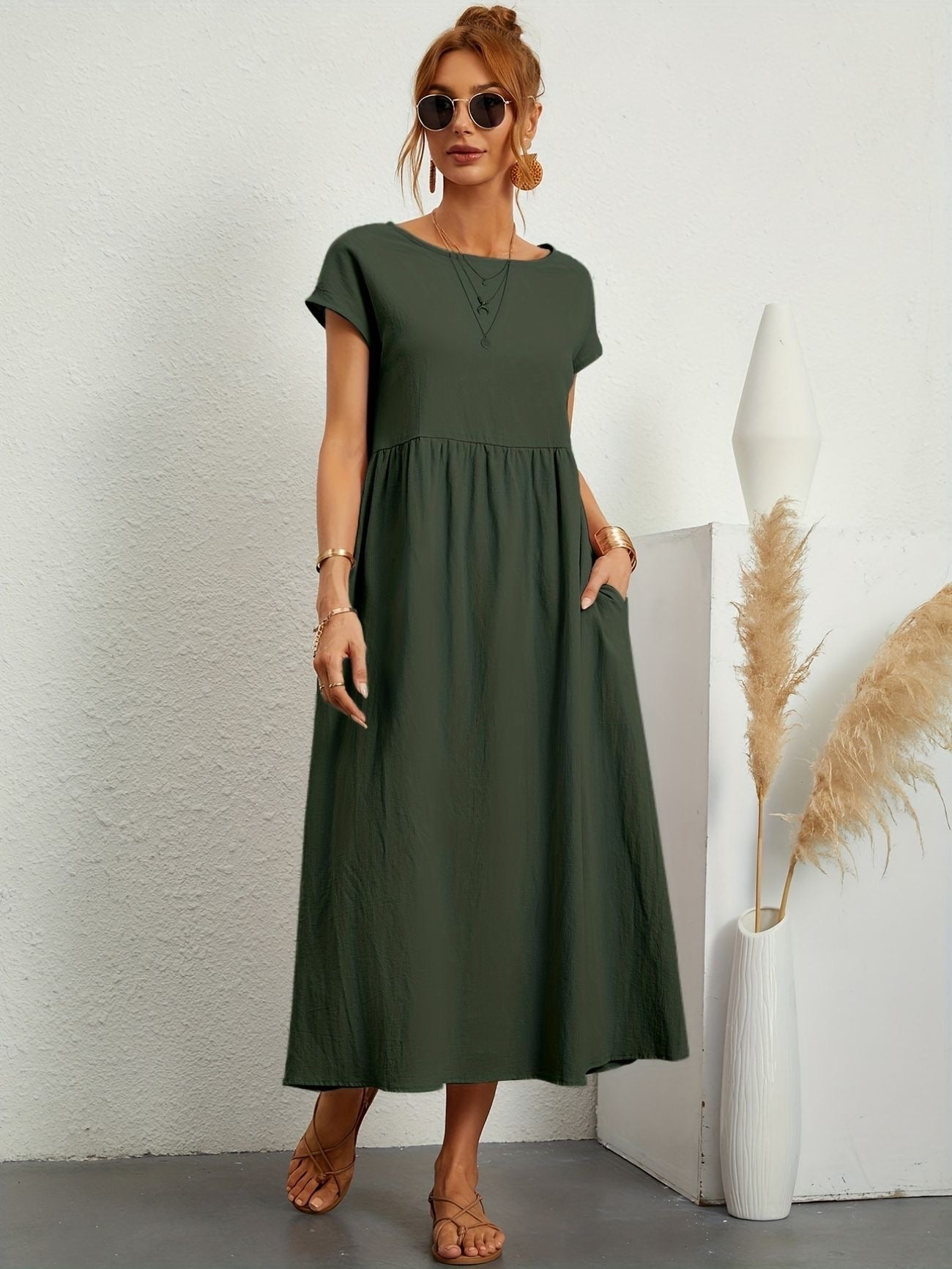 Maxi dress for women with short sleeves, featuring an A-line silhouette and a relaxed fit. 0