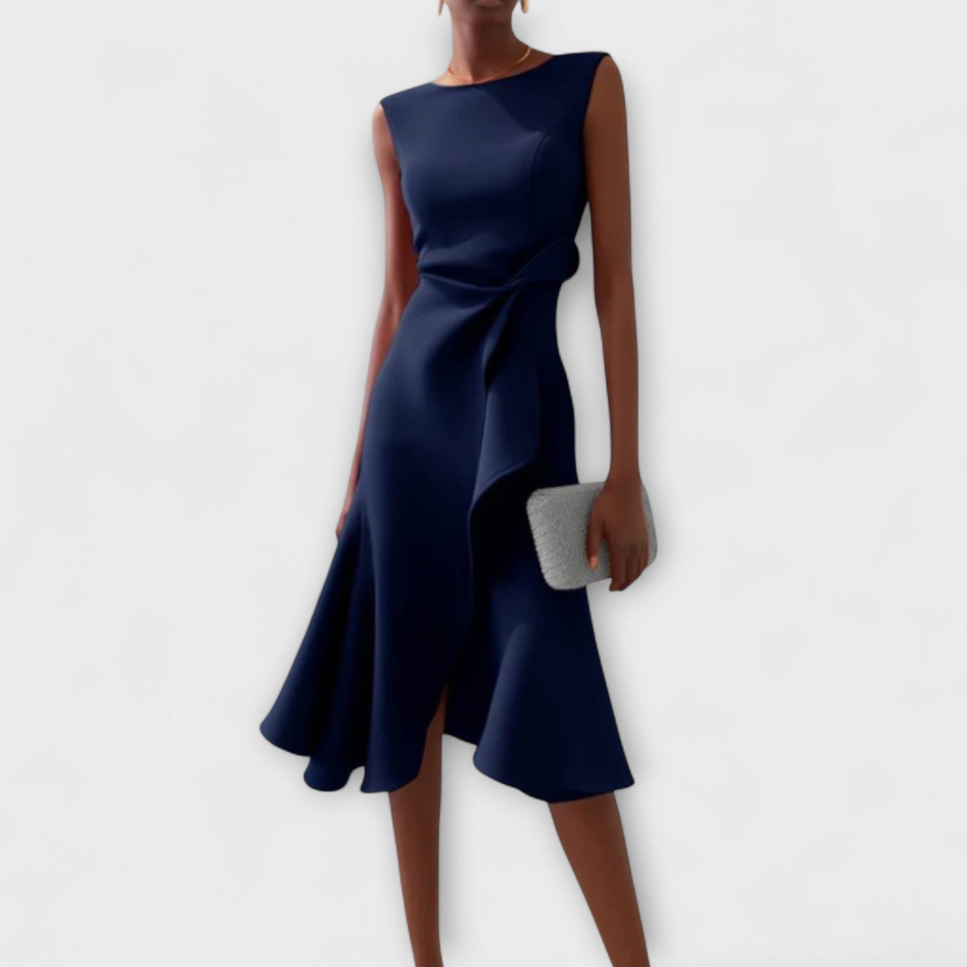 Dresses a midi length with asymmetrical draping, featuring a pleated design suitable for formal events. 2