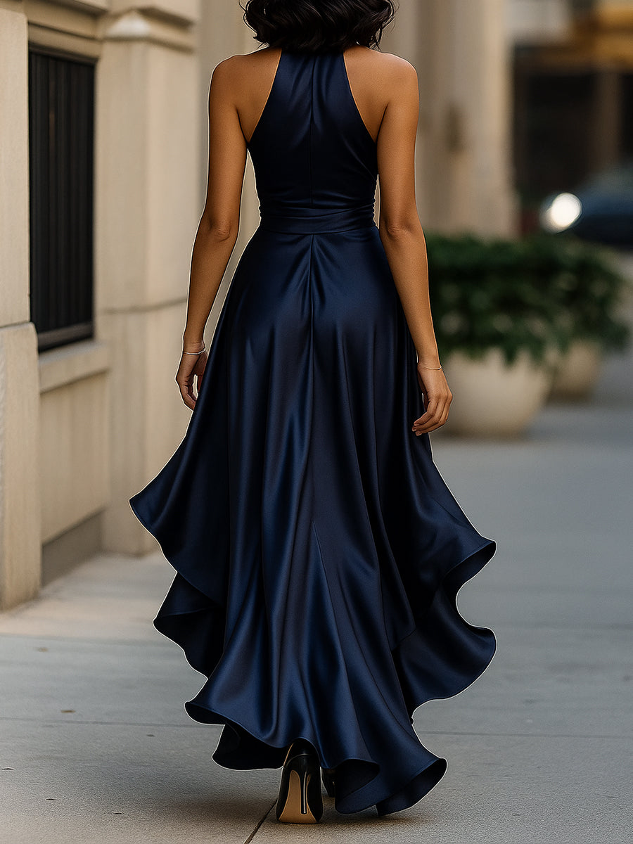 Dresses with a halter neckline and high-low hemline, featuring a flowing design and a feminine silhouette. 3