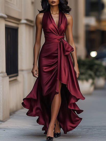 Dresses with a halter neckline and high-low hemline, featuring a flowing design and a feminine silhouette. 5