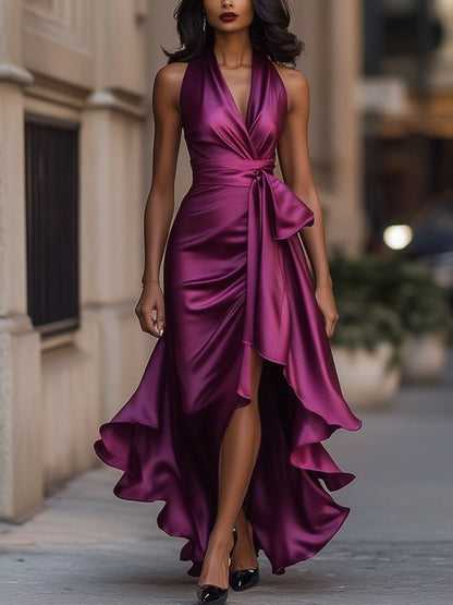 Dresses with a halter neckline and high-low hemline, featuring a flowing design and a feminine silhouette. 9