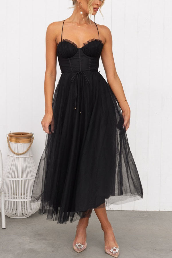 Dresses - A midi cocktail dress featuring a fitted bodice with a corset design and a flowing tulle skirt. 1