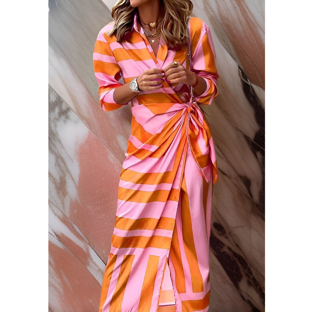 A woman wearing a fitted wrap dress, styled for a wedding, highlighting her figure with a defined waist and a flattering silhouette. 0