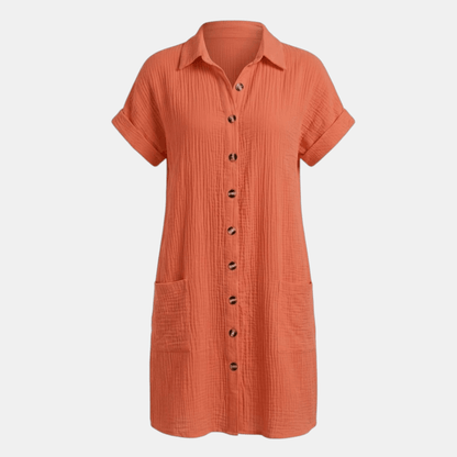Dresses | A short-sleeved shirt dress featuring a button-down front and side pockets, designed for summer wear. 10
