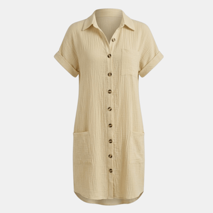 Dresses | A short-sleeved shirt dress featuring a button-down front and side pockets, designed for summer wear. 7