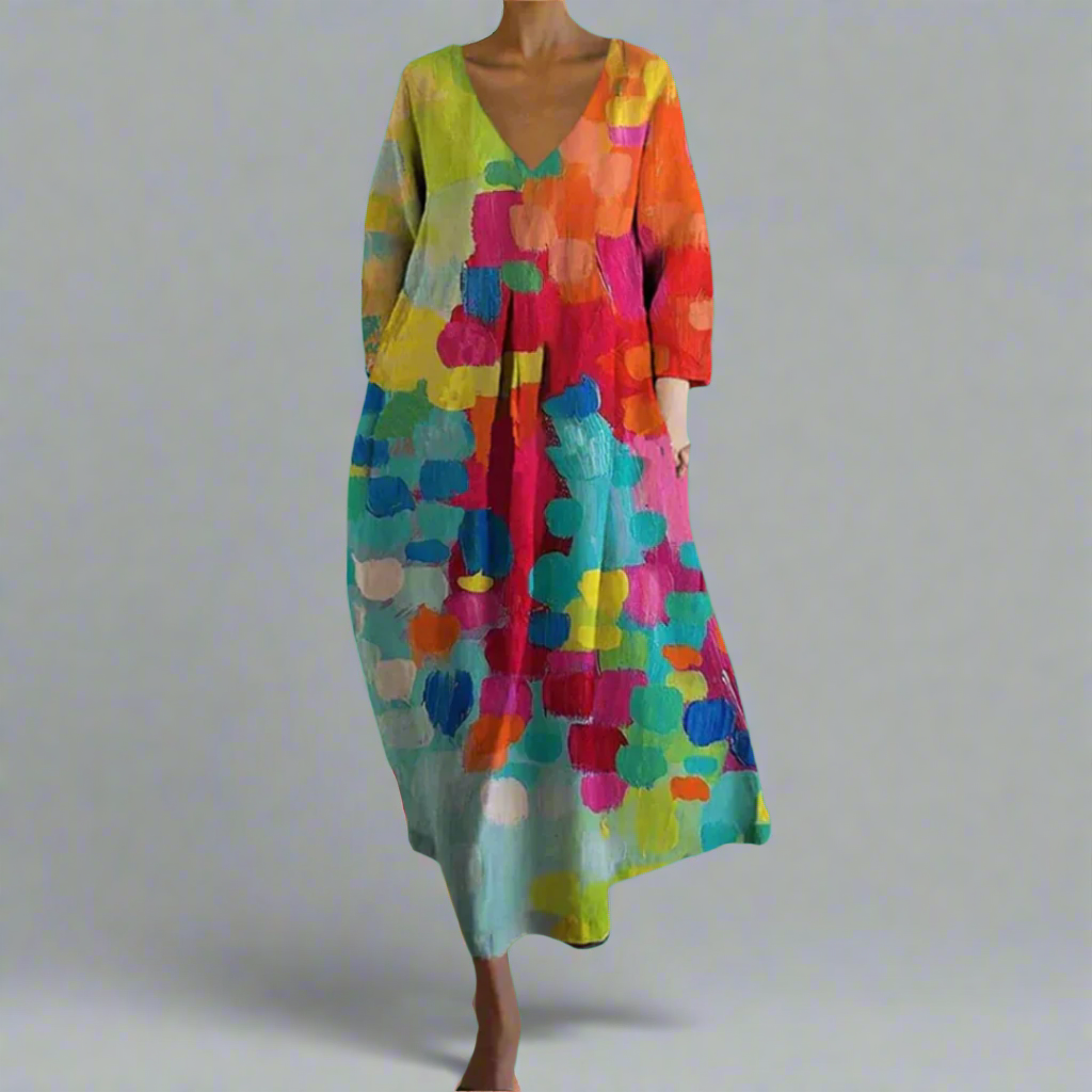 Maxi dress featuring a V-shaped neckline, designed for women, with a flowing silhouette and full-length design. 0