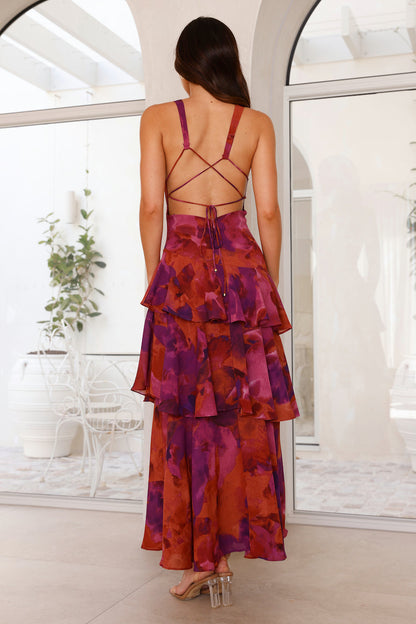 Maxi dress with a deep V-neckline, featuring a flowing silhouette and elegant design. 8