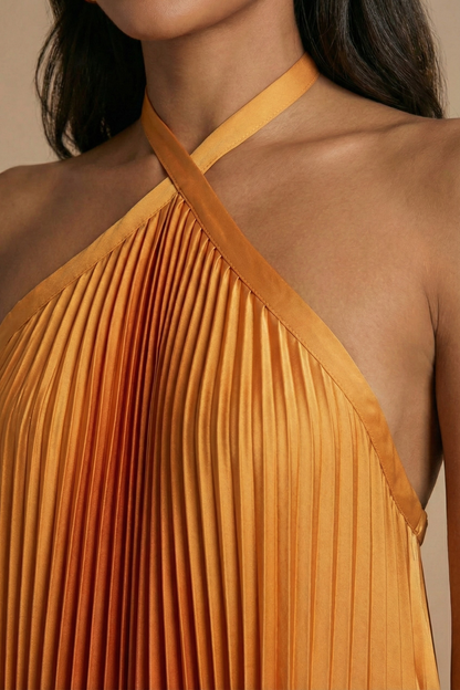 Maxi dress with pleats and an open back, designed for formal occasions such as weddings. 3