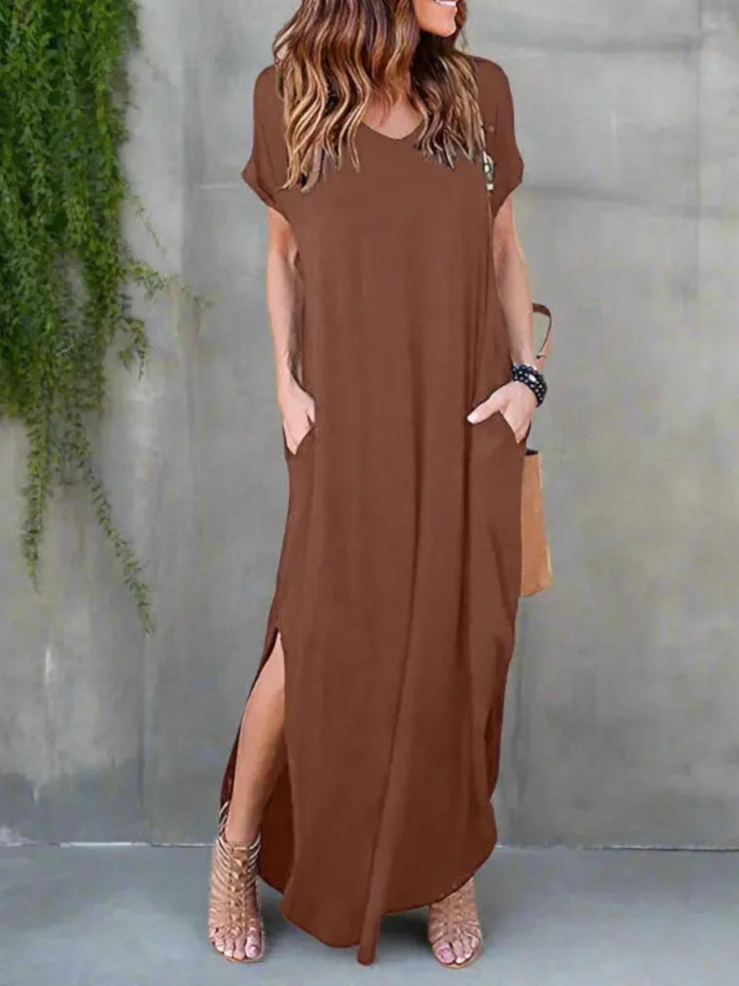Maxi T-shirt dress featuring a V-neckline and a side slit, designed for summer wear. 2