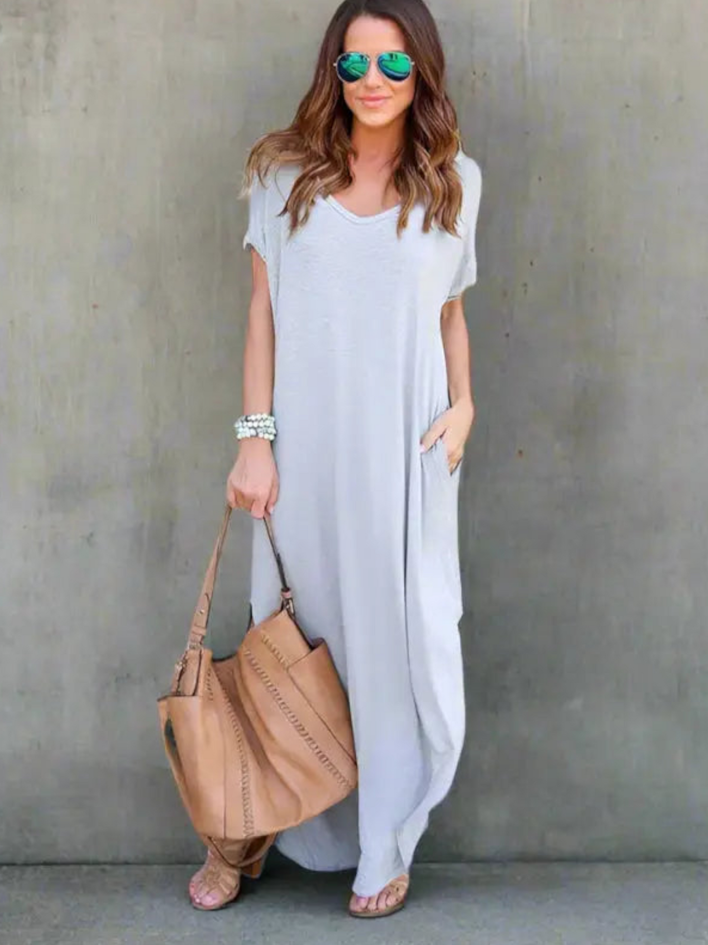 Maxi T-shirt dress featuring a V-neckline and a side slit, designed for summer wear. 6