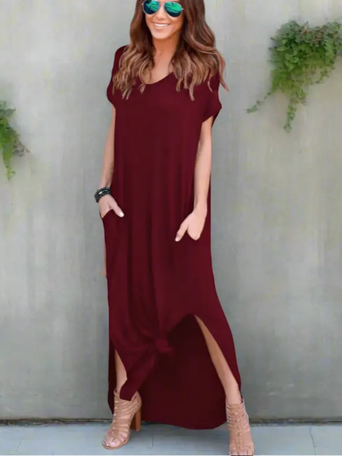 Maxi T-shirt dress featuring a V-neckline and a side slit, designed for summer wear. 7