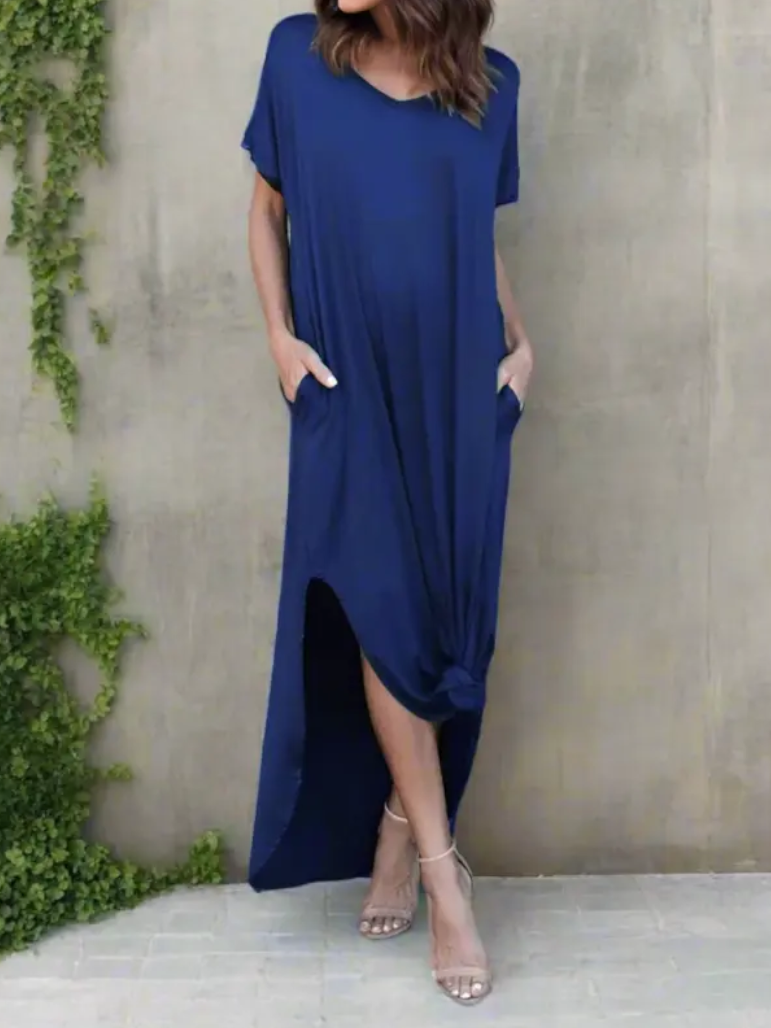 Maxi T-shirt dress featuring a V-neckline and a side slit, designed for summer wear. 8