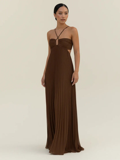 Maxi dress with a halter neckline and pleated A-line design, suitable for weddings. 0
