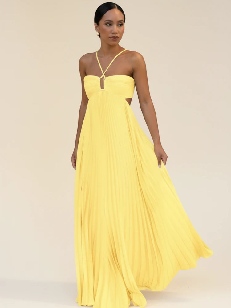 Maxi dress with a halter neckline and pleated A-line design, suitable for weddings. 2