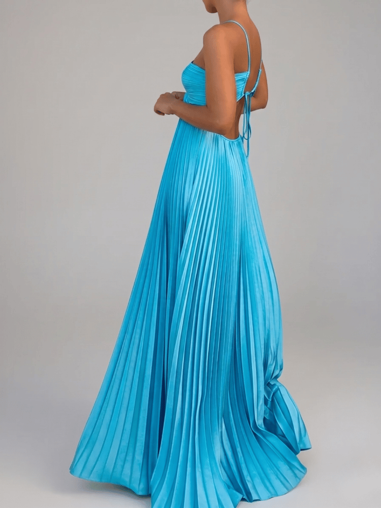 Maxi dress with a halter neckline and pleated A-line design, suitable for weddings. 5