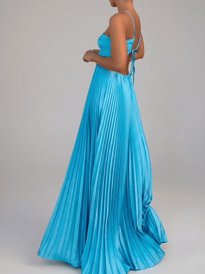 Maxi dress with a halter neckline and pleated A-line design, suitable for weddings. 5