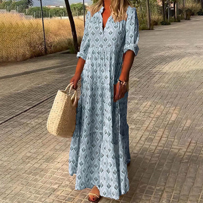 Maxi dress for women featuring a V-neckline and long sleeves, designed for formal occasions such as weddings. 0