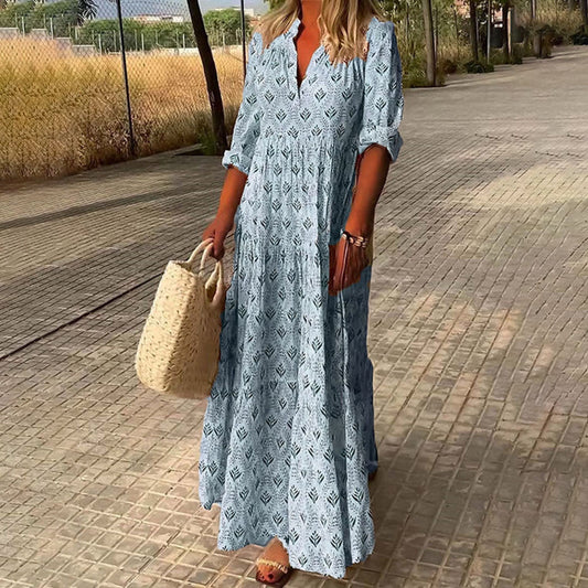 Maxi dress for women featuring a V-neckline and long sleeves, designed for formal occasions such as weddings. 0