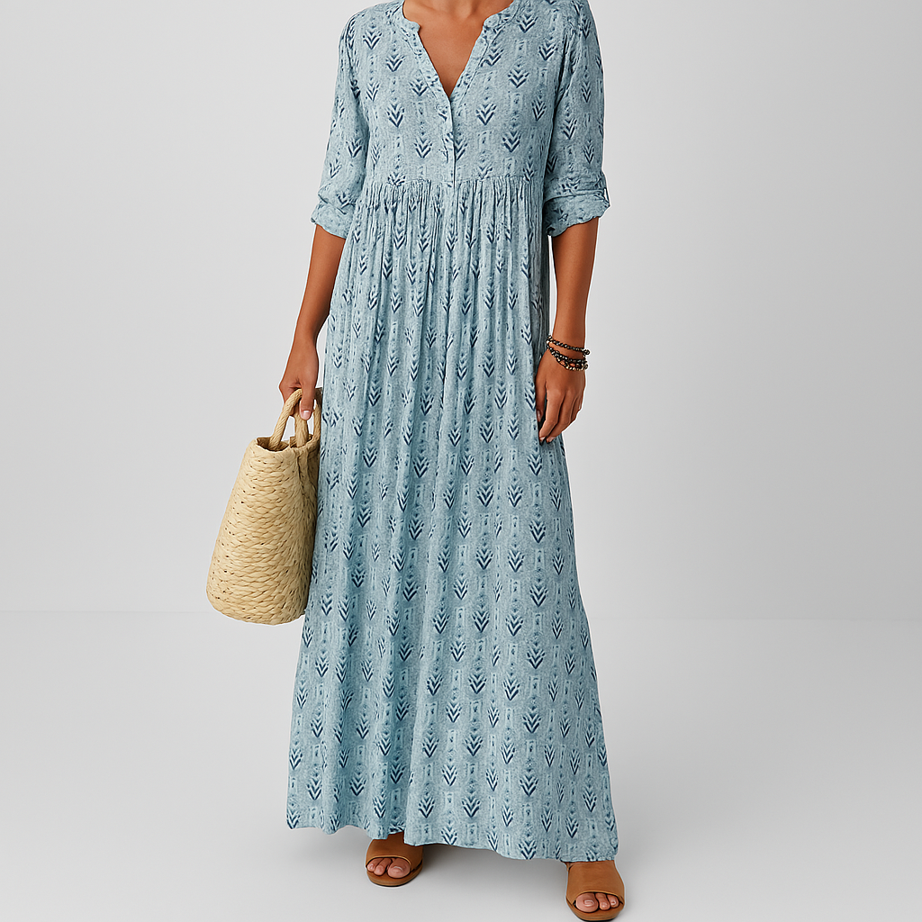 Maxi dress for women featuring a V-neckline and long sleeves, designed for formal occasions such as weddings. 1