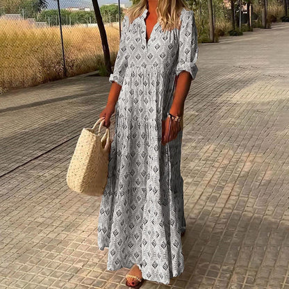 Maxi dress for women featuring a V-neckline and long sleeves, designed for formal occasions such as weddings. 2