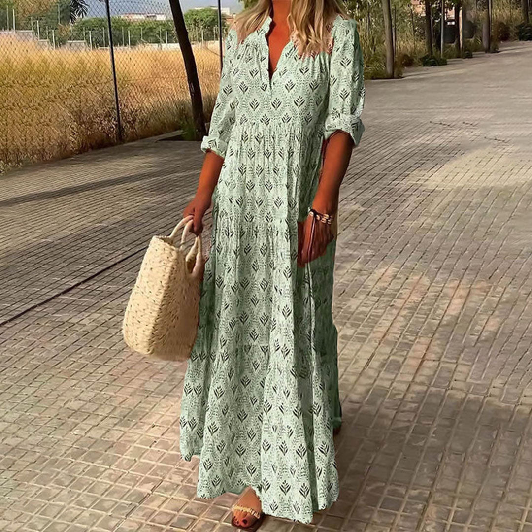 Maxi dress for women featuring a V-neckline and long sleeves, designed for formal occasions such as weddings. 3