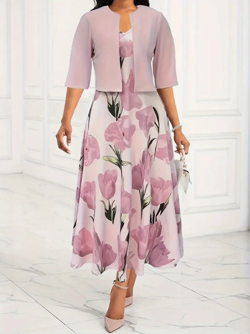 Maxi dress with a floral pattern paired with a fitted blazer, displayed on a mannequin against a neutral background. 0