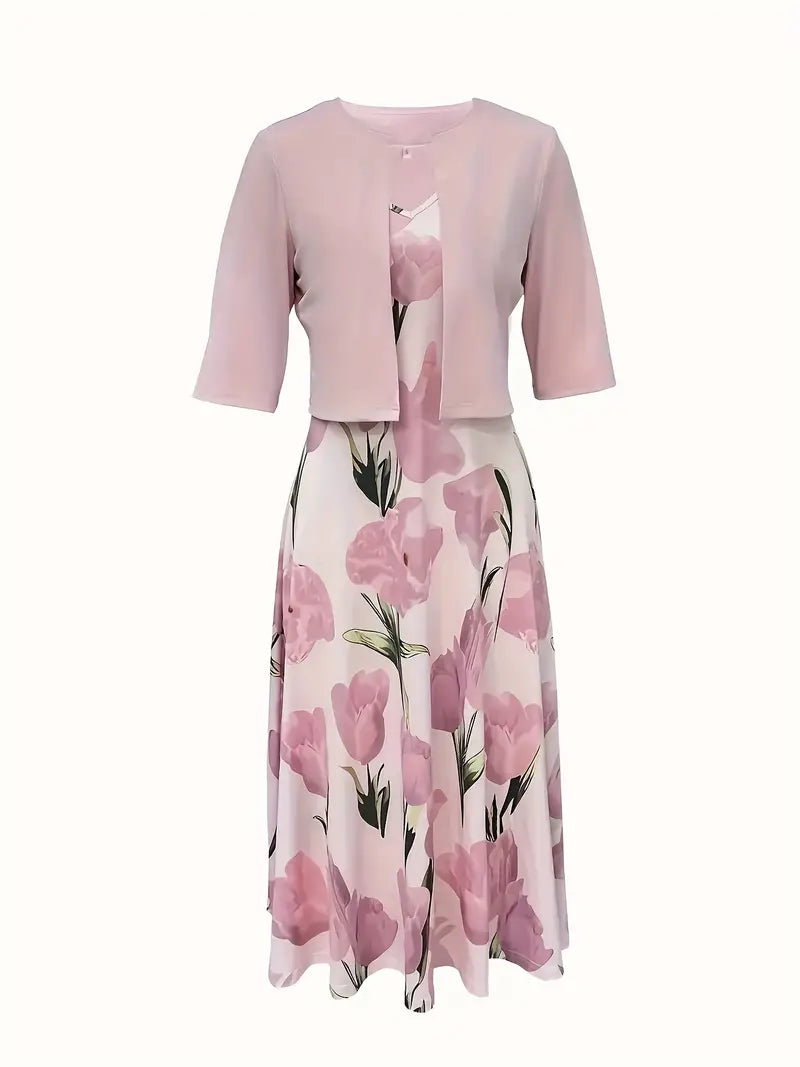Maxi dress with a floral pattern paired with a fitted blazer, displayed on a mannequin against a neutral background. 1