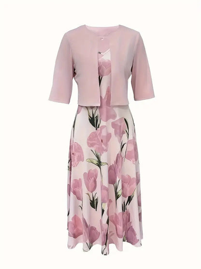 Maxi dress with a floral pattern paired with a fitted blazer, displayed on a mannequin against a neutral background. 1