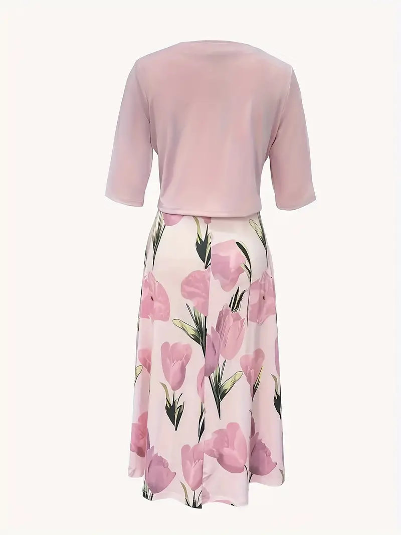 Maxi dress with a floral pattern paired with a fitted blazer, displayed on a mannequin against a neutral background. 2