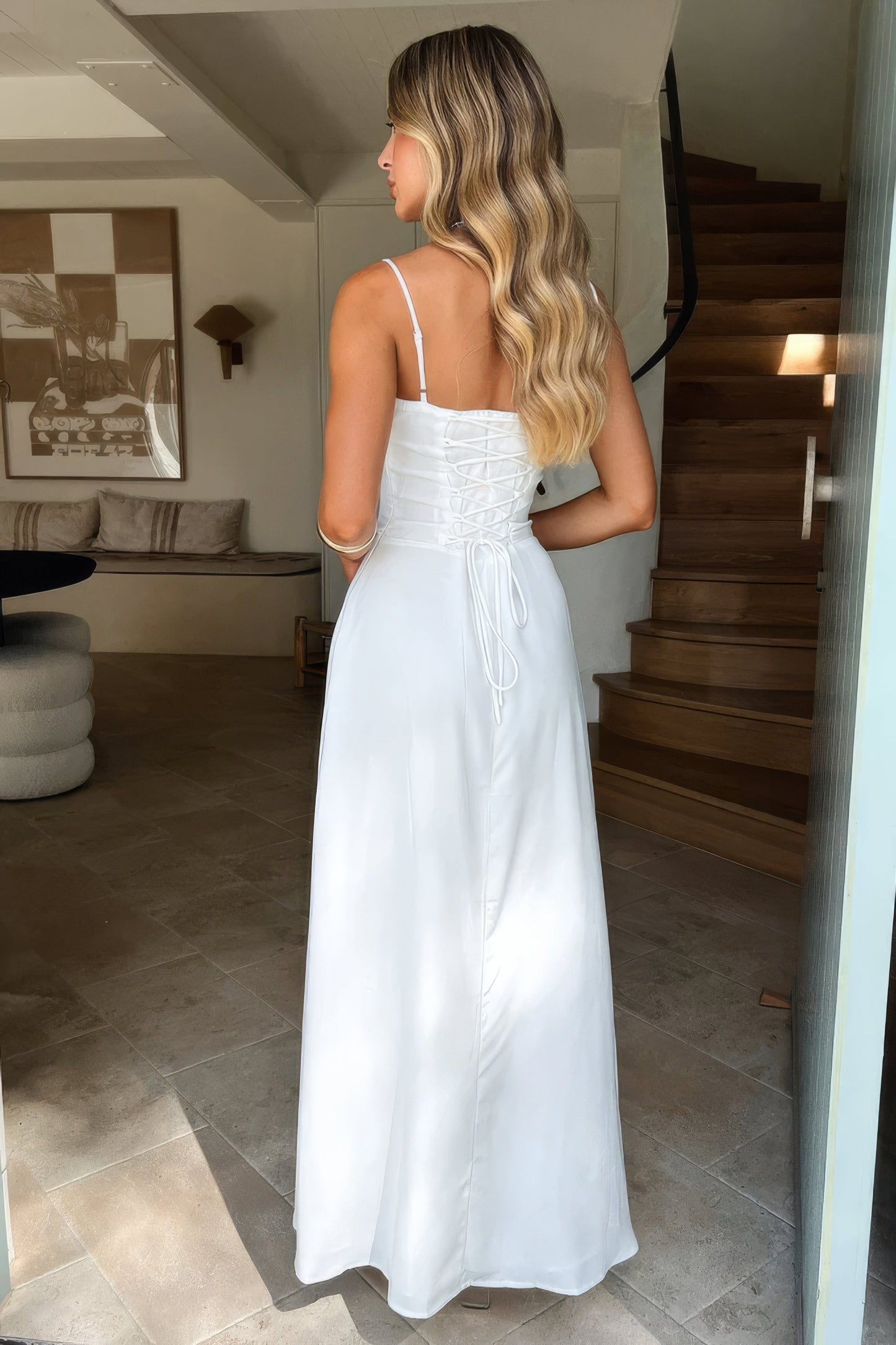 Maxi dress for women with spaghetti straps and a heart-shaped neckline, designed for formal events such as weddings. 2