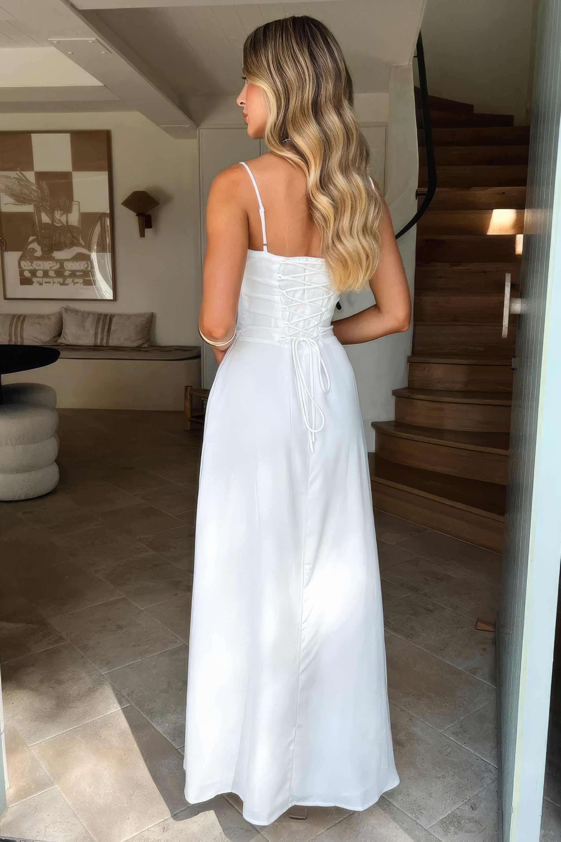 Maxi dress for women with spaghetti straps and a heart-shaped neckline, designed for formal events such as weddings. 2