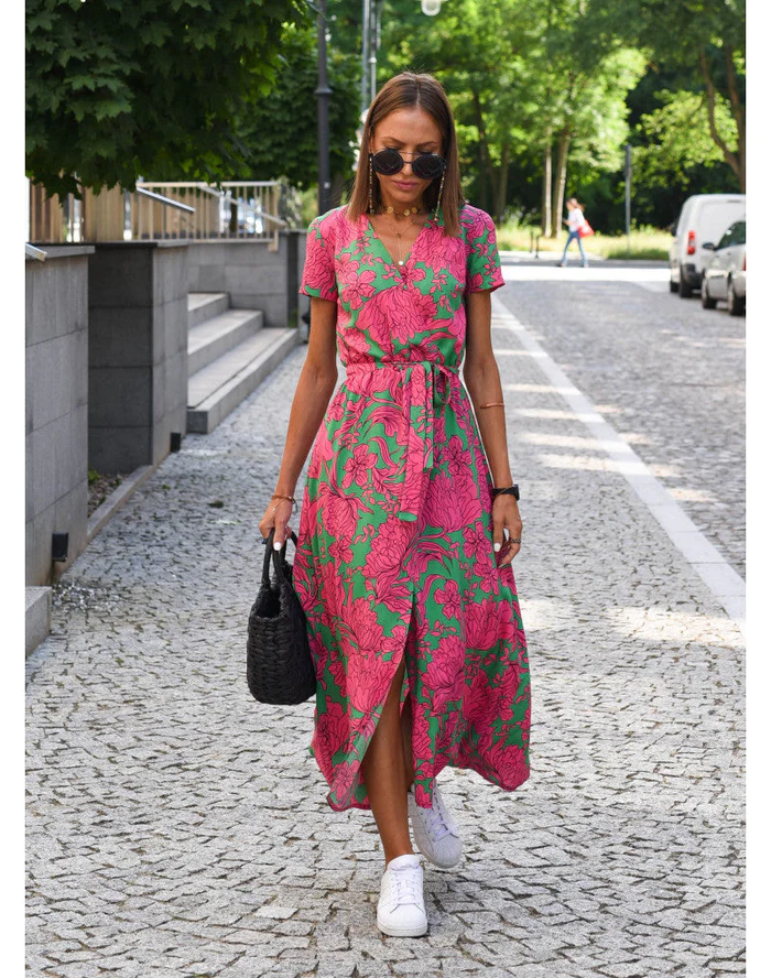 Maxi dress with short sleeves and a wrap neckline, designed for formal occasions such as weddings. 2