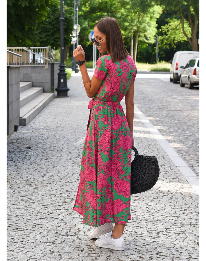 Maxi dress with short sleeves and a wrap neckline, designed for formal occasions such as weddings. 6