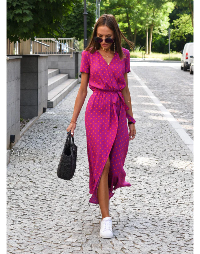 Maxi dress with short sleeves and a wrap neckline, designed for formal occasions such as weddings. 7