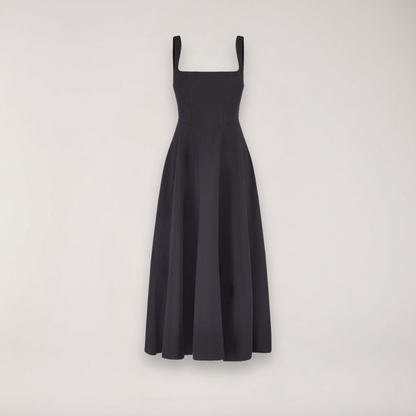 A midi dress for women featuring a fitted waist and a pleated skirt, designed for formal occasions like weddings. 10
