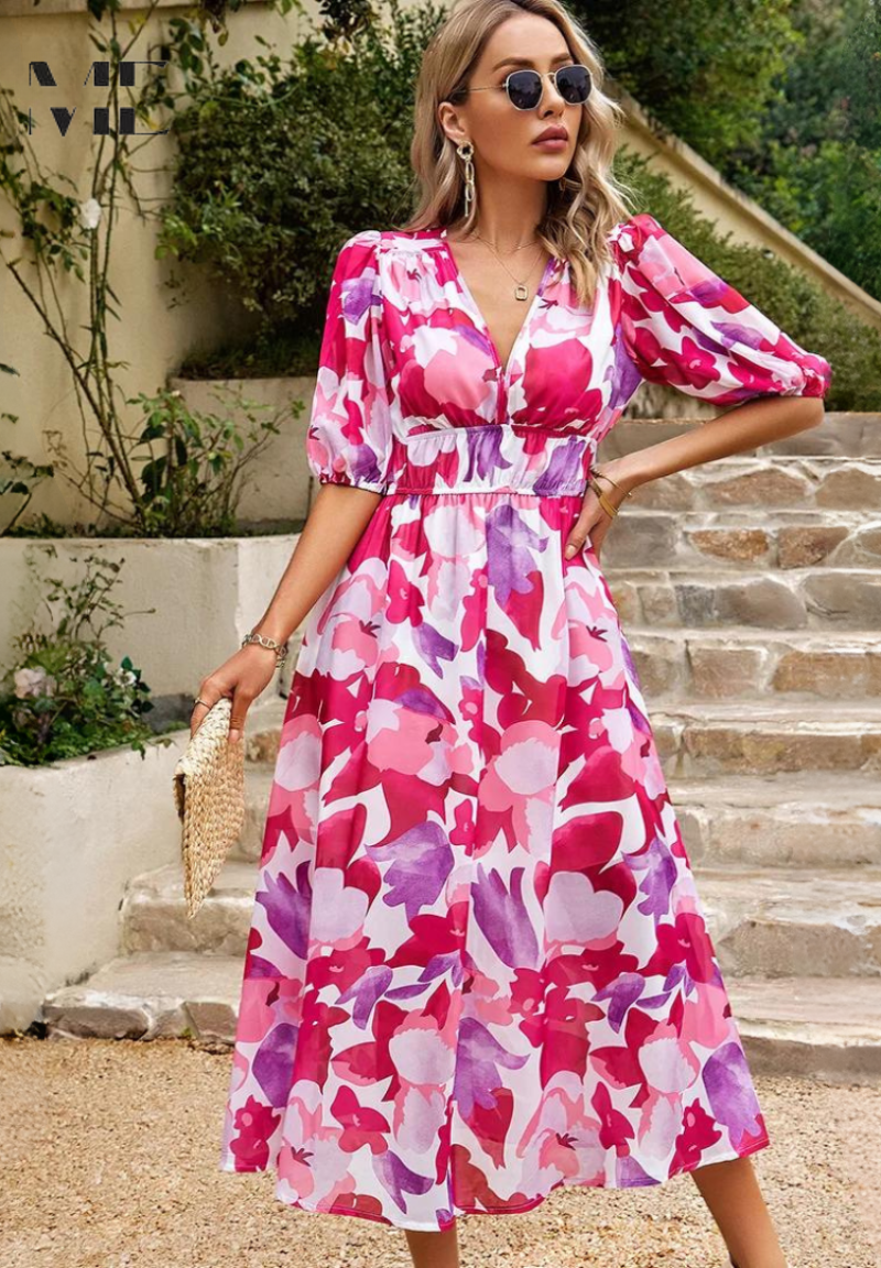 Midi dress featuring a floral print and puff sleeves. 9