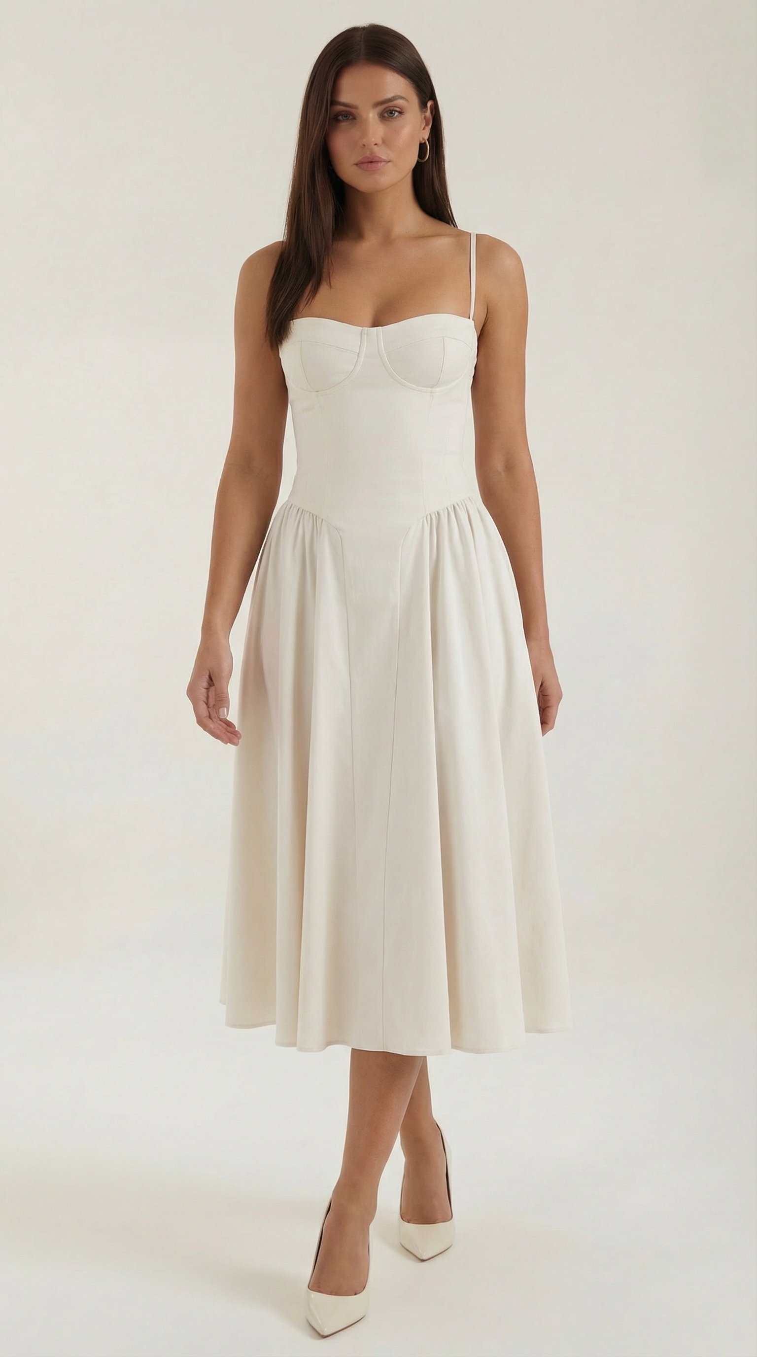 A midi dress featuring a floral print and a corset-style belt, designed for women's formal events such as weddings and summer celebrations. 10