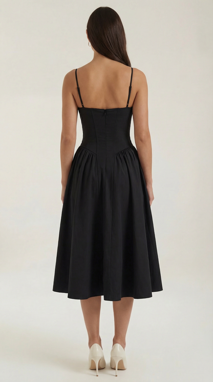 A midi dress featuring a floral print and a corset-style belt, designed for women's formal events such as weddings and summer celebrations. 8