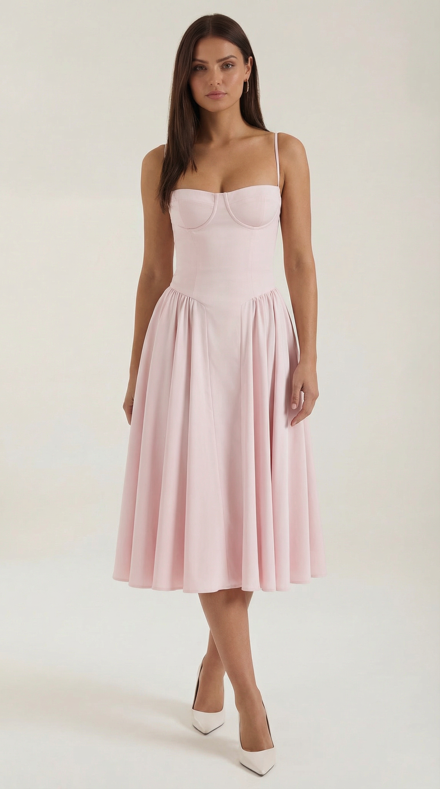 A midi dress featuring a floral print and a corset-style belt, designed for women's formal events such as weddings and summer celebrations. 9